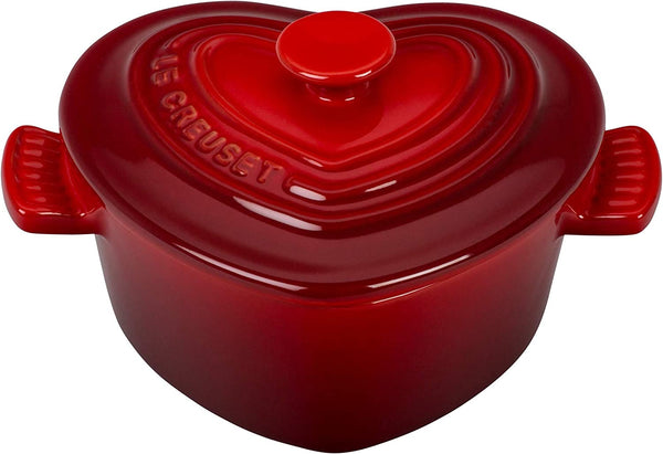 a red heart covered 8 oz soup pan by Le Creuset